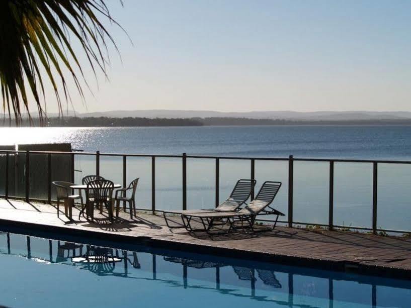 The Beachcomber Hotel & Resort, Ascend Hotel Collection Тукли Екстериор снимка View of the bay from a hotel
